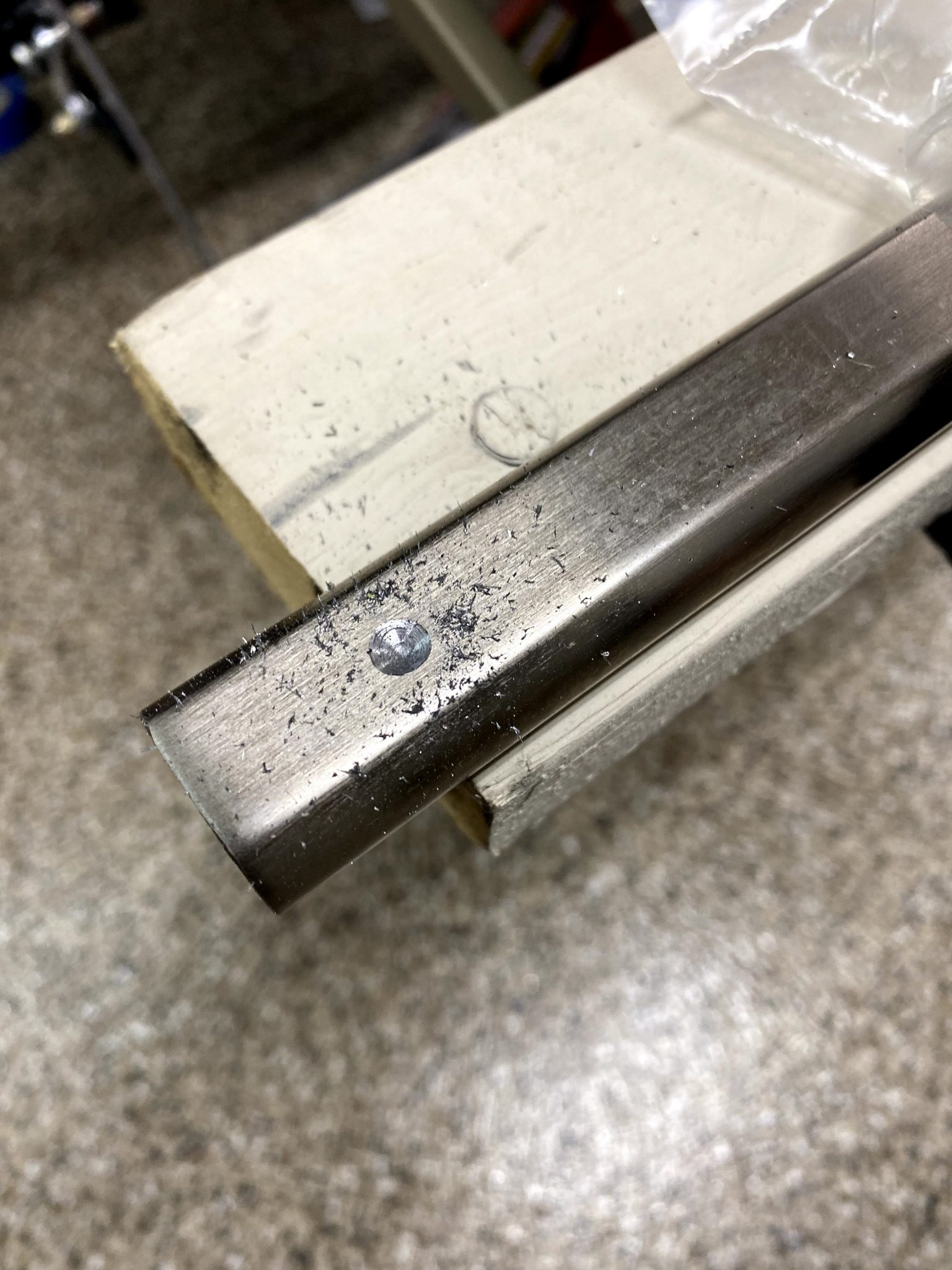 drilled tab for D tube