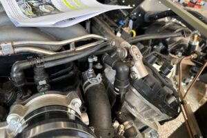 Engine bay vacuum and fuel lines