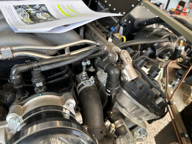Engine bay vacuum and fuel lines
